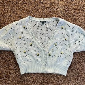 Baby blue crochet crop top, size large with flower pattern